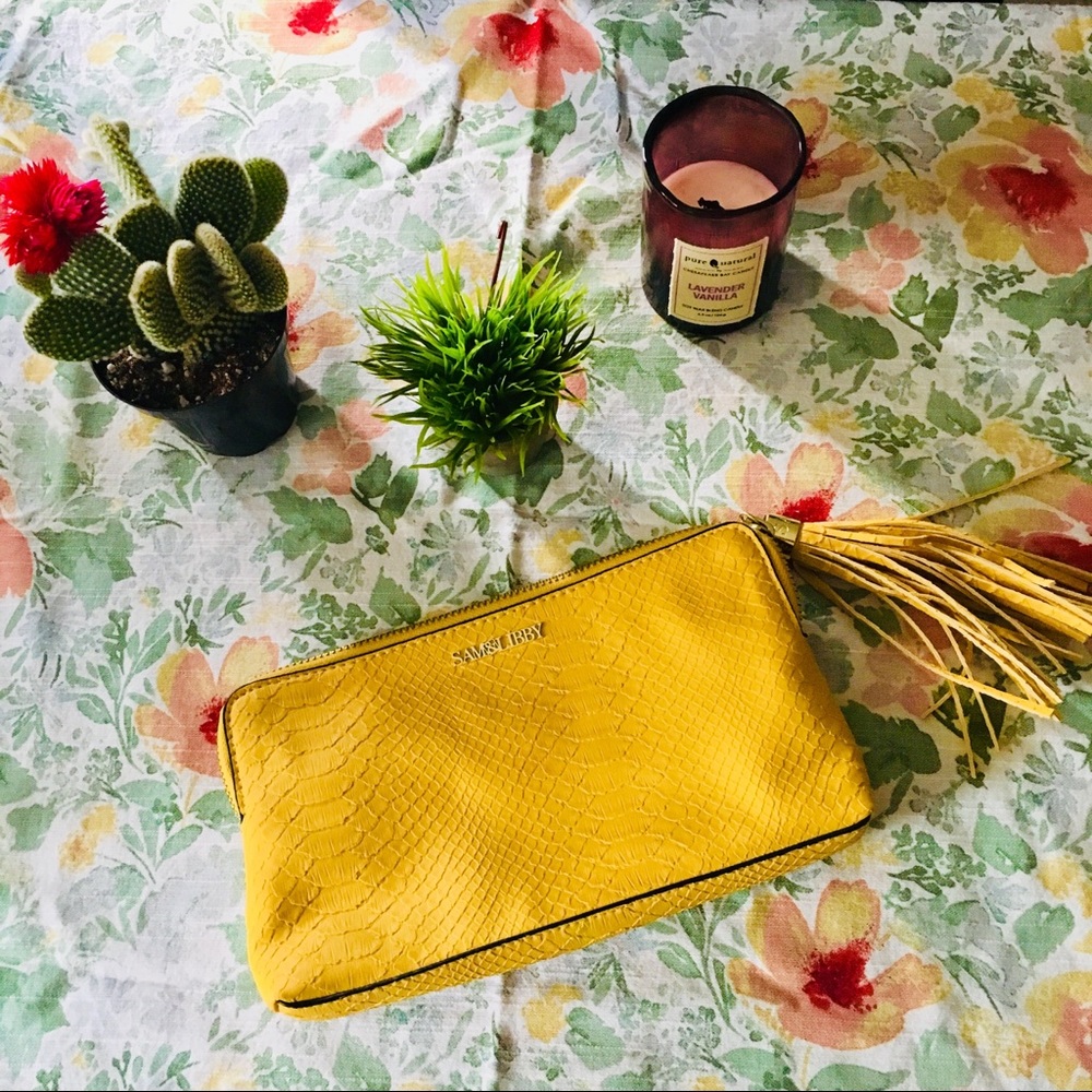 New yellow handbag with tassel/ clutch